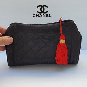 CHANEL black quilted makeup bag with red tassle, Beaute collection, NY, NY